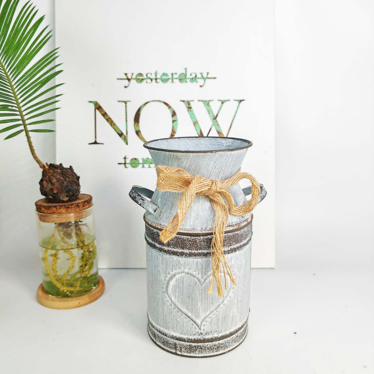Distressed metal milk jug vase with jute rope wrap