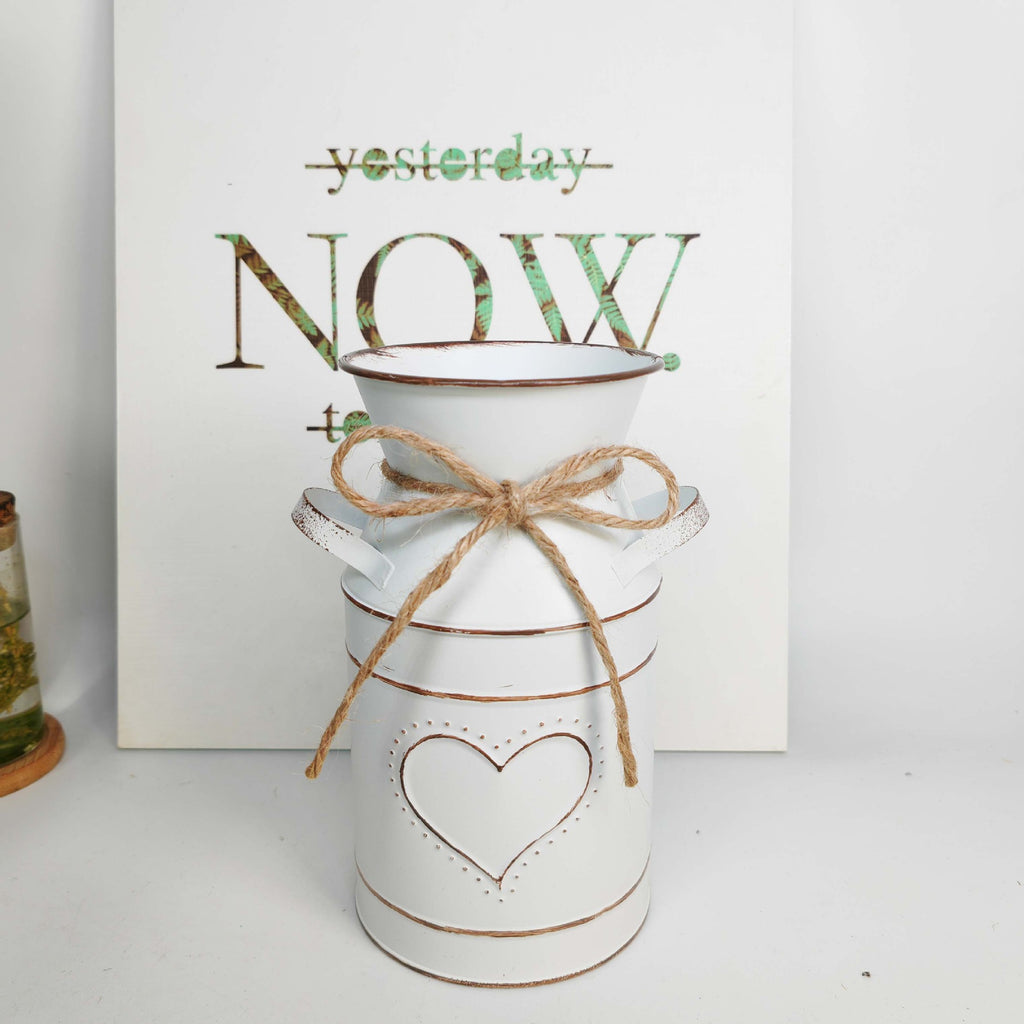Distressed metal milk jug vase with jute rope wrap
