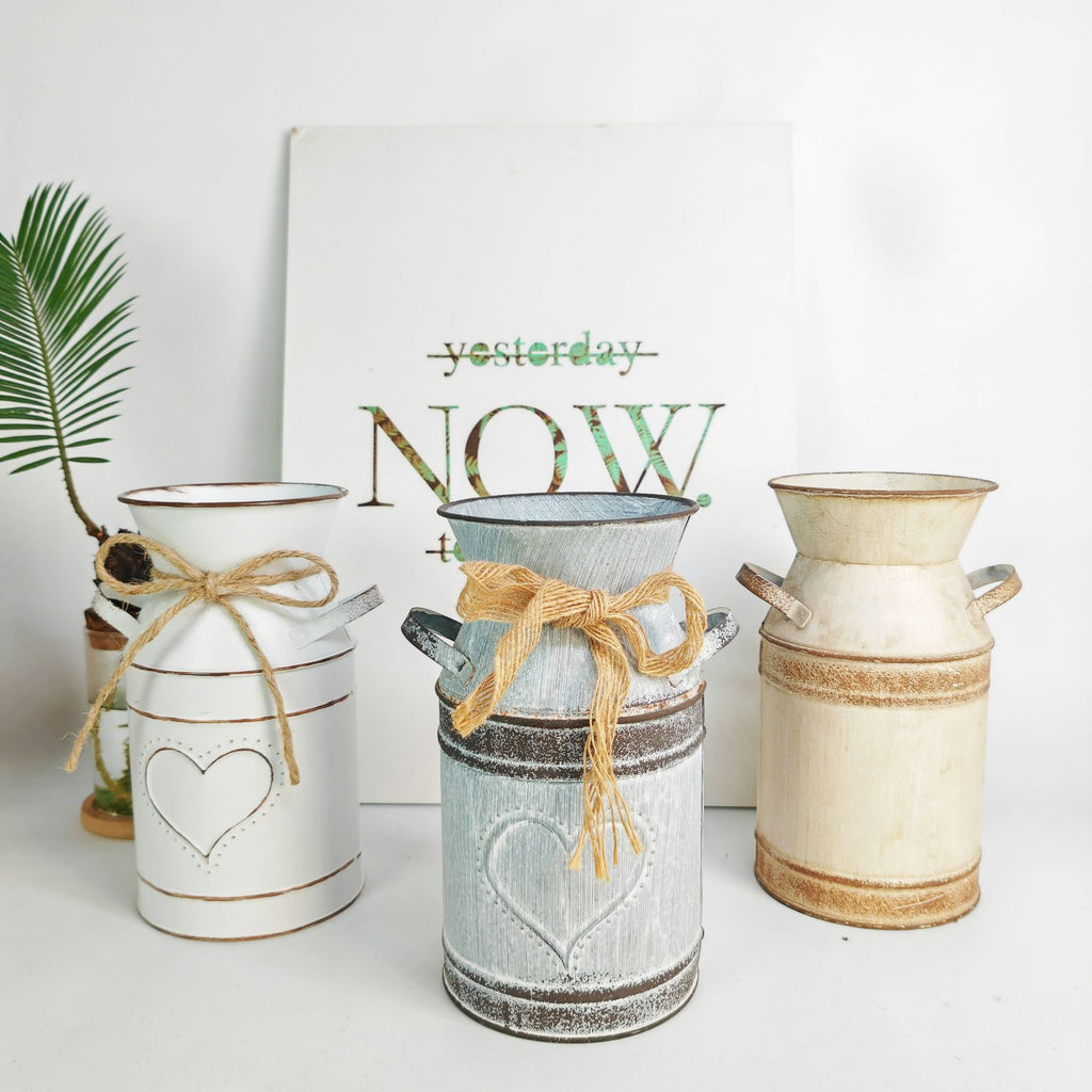 Distressed metal milk jug vase with jute rope wrap